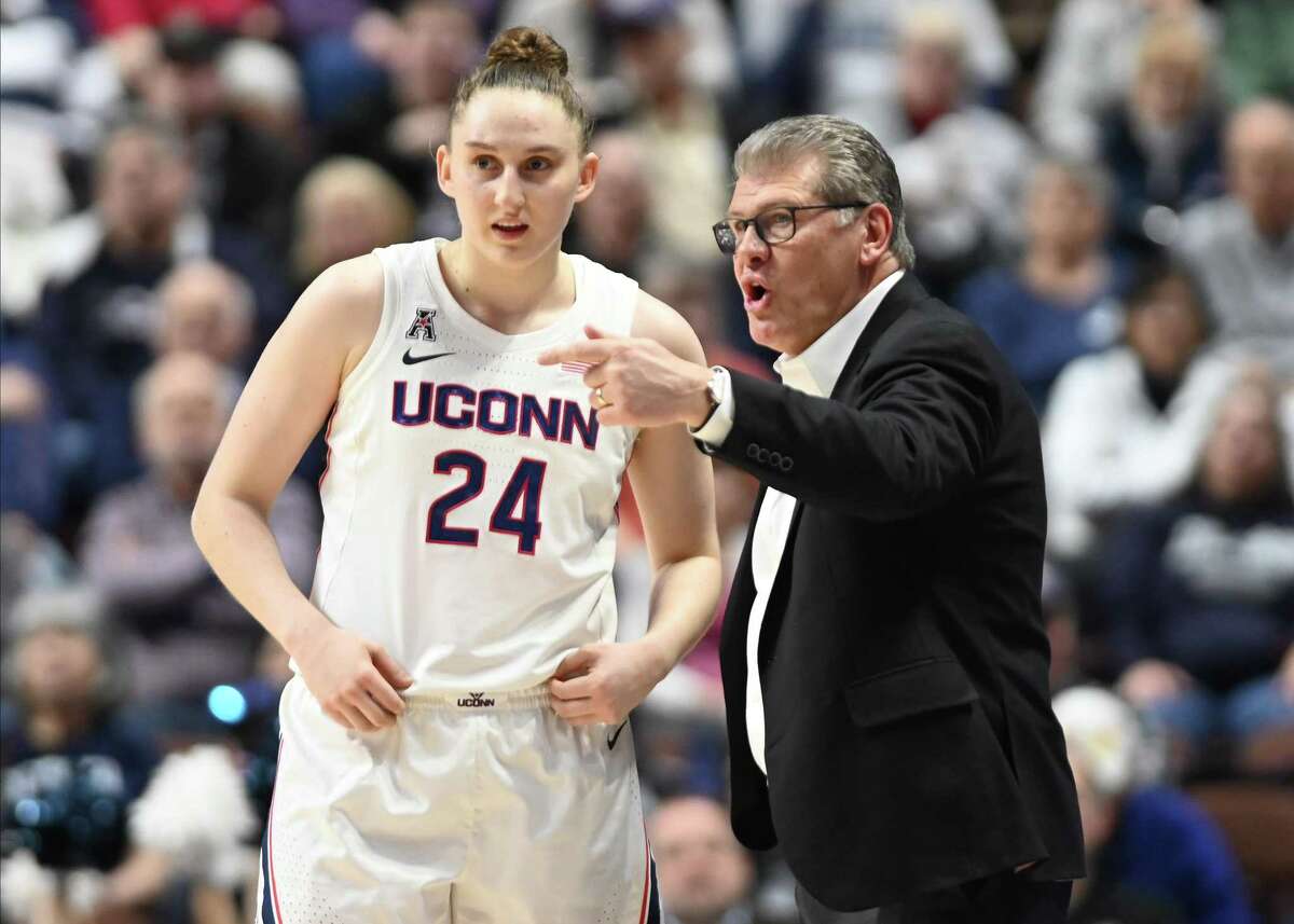 UConn coach Gino Auriemma goes over a play with Huskies guard Anna Makurat (24) during the game as the Temple Owls take on the UConn Huskies during the women's American Athletic Conference Tournament game on March 7, 2020, at the Mohegan Sun Arena in Uncasville. Makurat is entering the transfer portal.