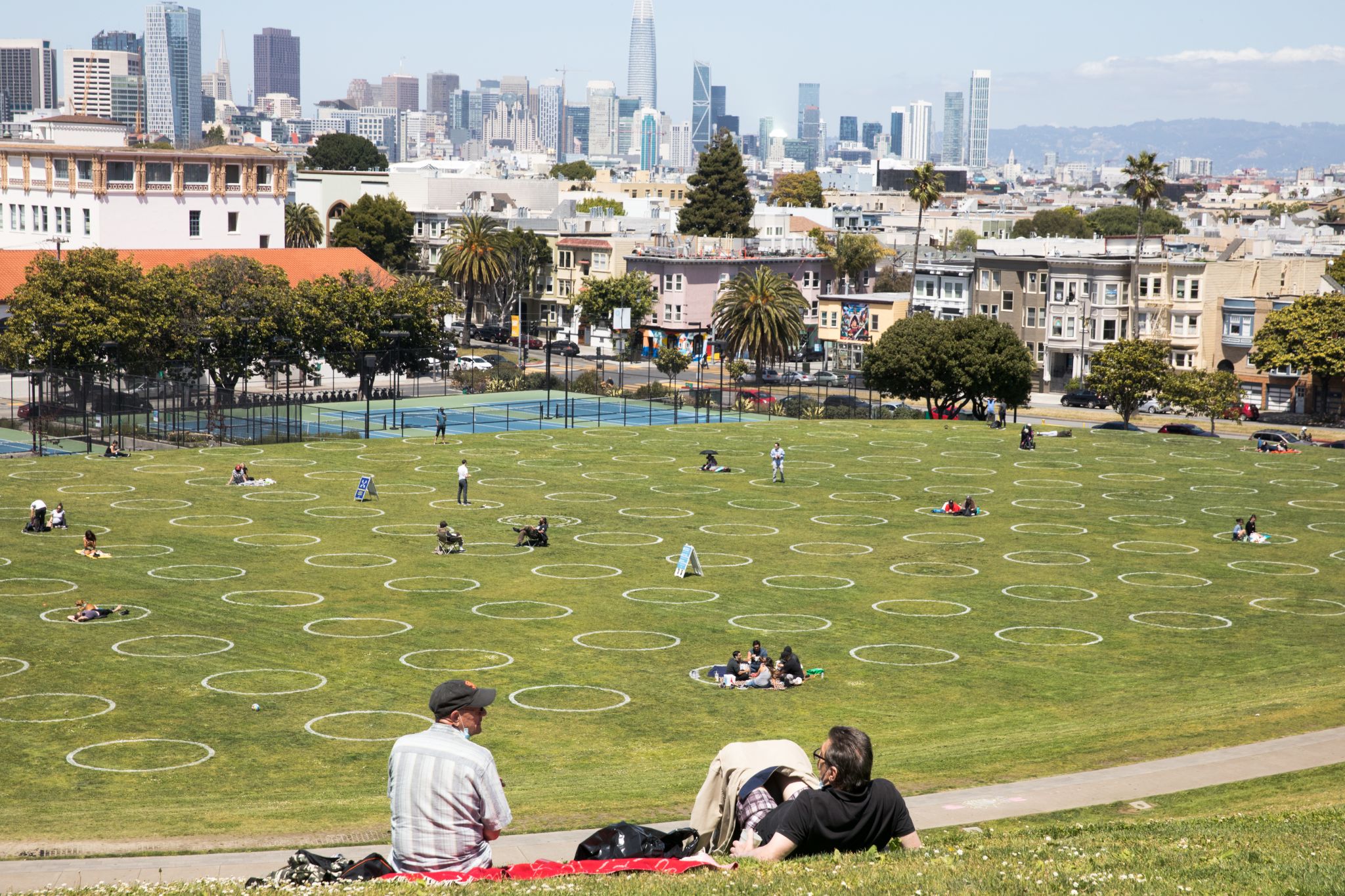 Human parking spots' descend on San Francisco's Dolores Park to k...