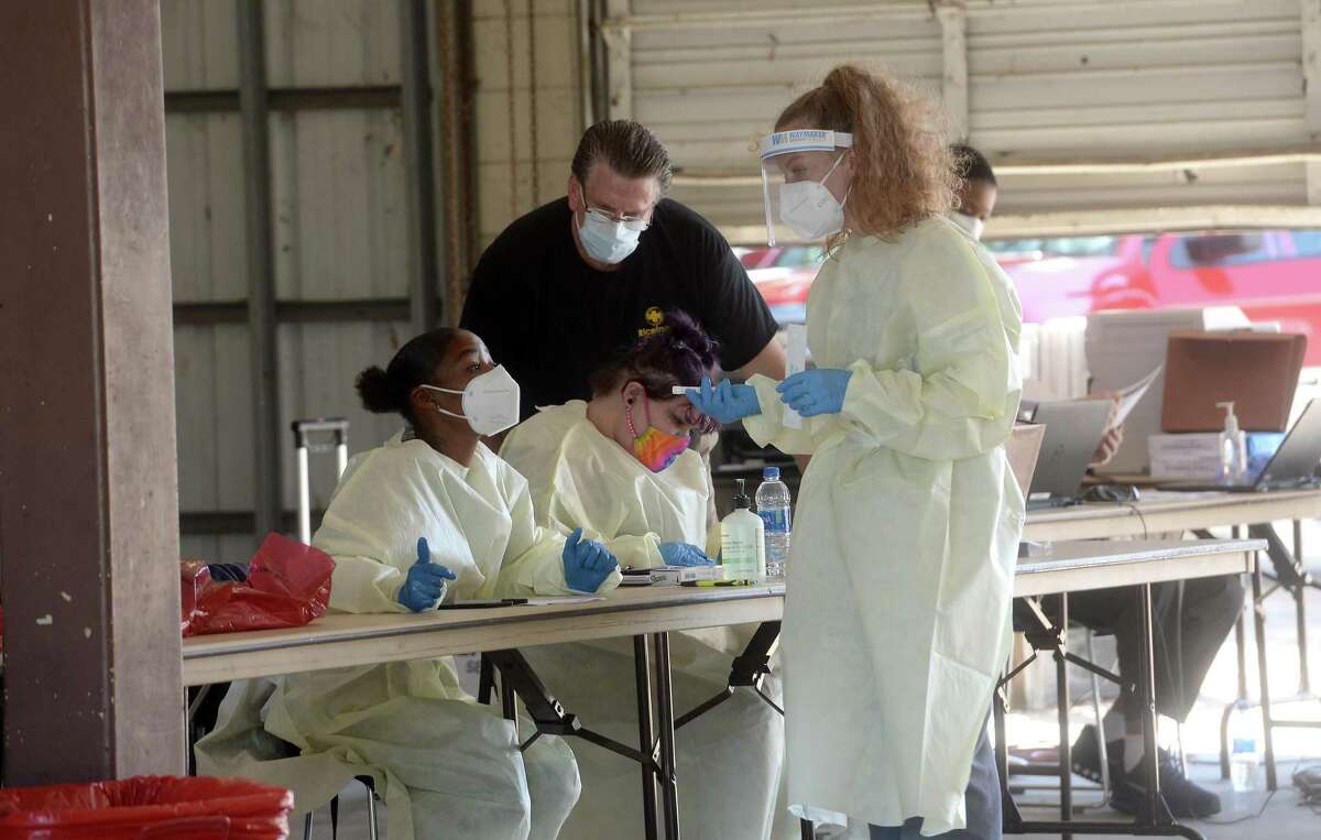Healthcare workers with Riceland man a testing station at the former Beaumont Fire Station #1 Tuesday. Testing will continue at the site through Thursday. Appointments must be made, although there are no symptom requirements to obtain the test. Riceland will set up again in two weeks for another round of testing. Mayor Becky Ames encourages citizens to get tested and continue to practice safety measures, including wearing masks and observing social distancing. She also stronlgly enncourages those who have recovered to donate plasma, which contains antibodies that have proven useful in treating those fighting the virus. Photo taken Tuesday, May 19, 2020 Kim Brent/The Enterprise