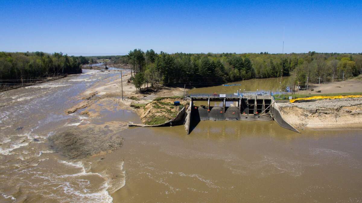 An aerial photo taken Thursday, May 21, 2020 shows the aftermath of record flooding following the breach of the Edenville Dam and failure of the Sanford Dam in Midland County. The Tittabwassee River reached a record 35.05 feet in Midland on Wednesday, May 20.