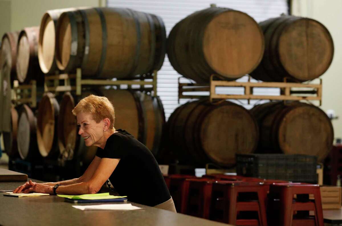 B-52 Brewing Co-owner Pam Daniels shares a laugh as she meets with employees to prepare for the brewery’s Friday reopening, Wednesday, April 20, 2020, in Conroe. The Brewery reopens to customers Friday with social distancing and other guidelines under Gov. Greg Abbott’s phased reopening of the economy.