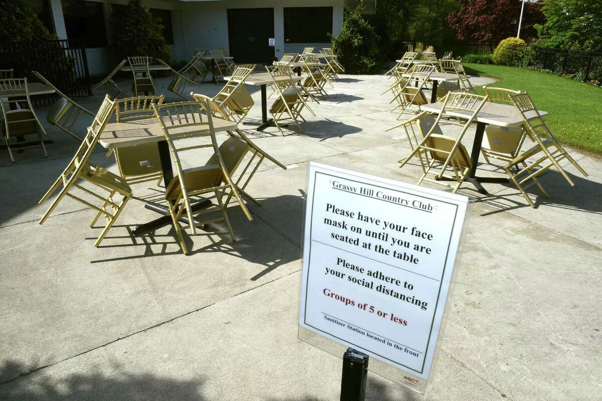A dining area set up at the Grassy Hill Country Club in Orange on May 20, 2020.