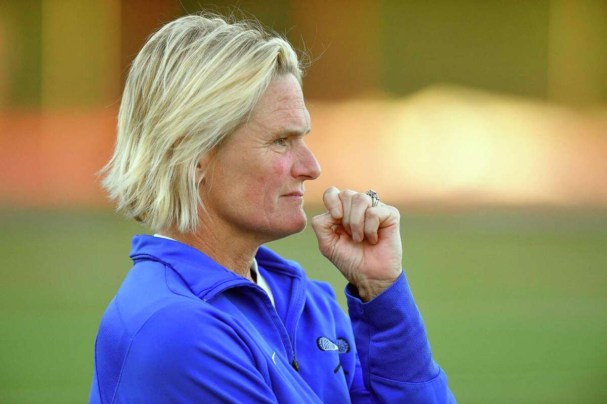 Darien Coach Lisa Lindley follows the action in the first half in a CIAC Class L semifinal girls lacrosse game against New Canaan at Jack Casagrande Field on June 5, 2018 in Norwalk, Connecticut.