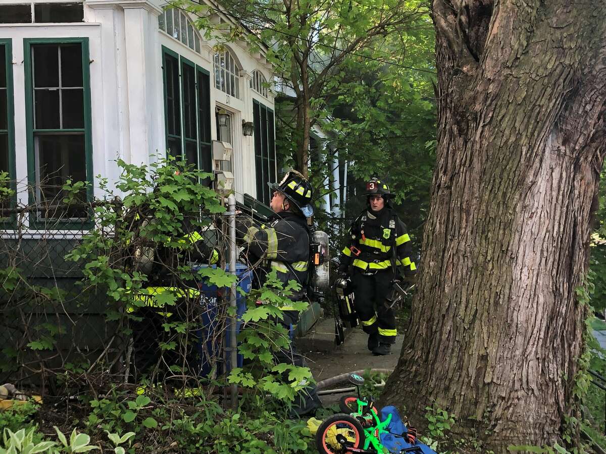 Albany City firefighters battle a house fire at 271 West Lawrence Ave. in Albany’s Pine Hills neighborhood Thursday morning, May 21, 2020. (Gary Hahn / Times Union)