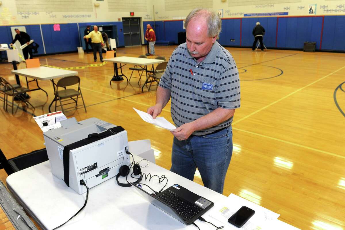 Rick Marcone testing a new voting station for handicapped voters in 2016.