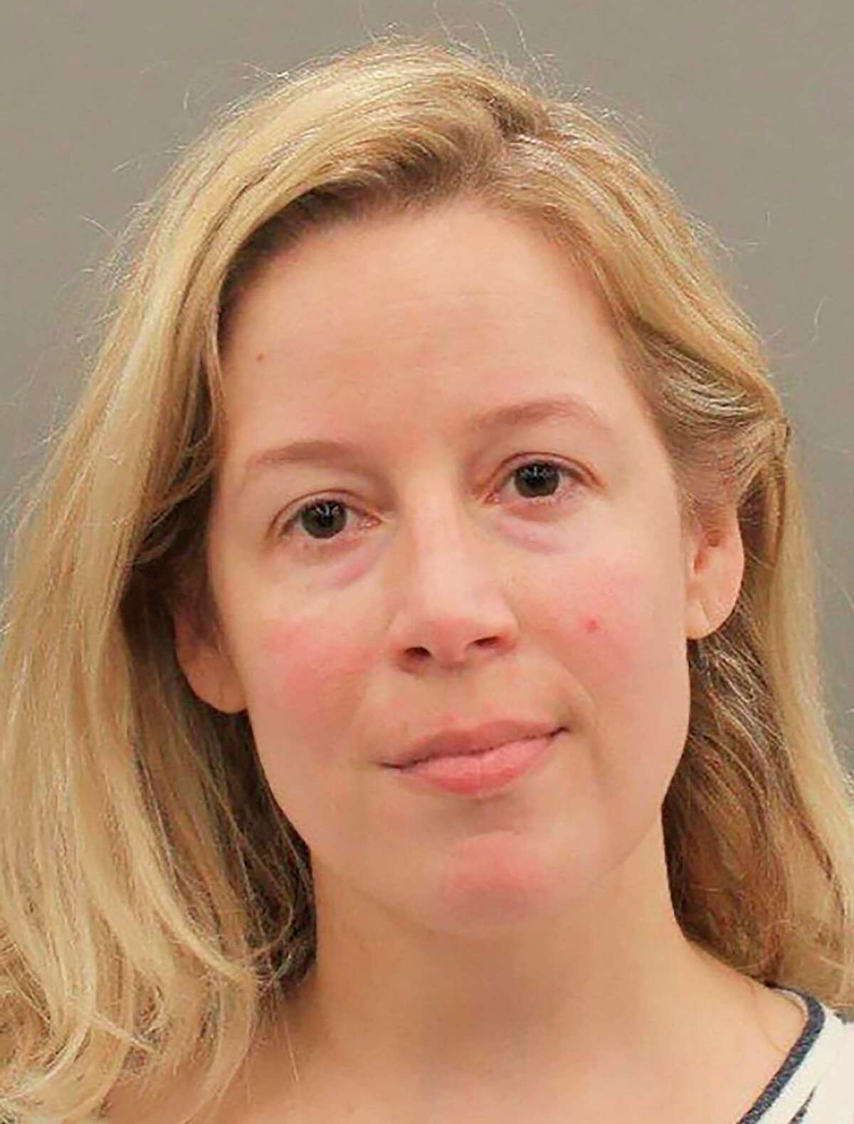 This undated photo provided by the Harris County District Attorney's Office shows Leslie Ann Caron. Prosecutors in Houston said Wednesday, May 20, 2020, that Caron, the girlfriend former Texas Lt. Gov. David Dewhurst, was arrested on charges of injuring the longtime Republican officeholder in an alleged attack that broke two of his ribs. Caron was charged with injury to an elderly person, a third-degree felony in Texas. (Harris County District Attorney's Office via AP)