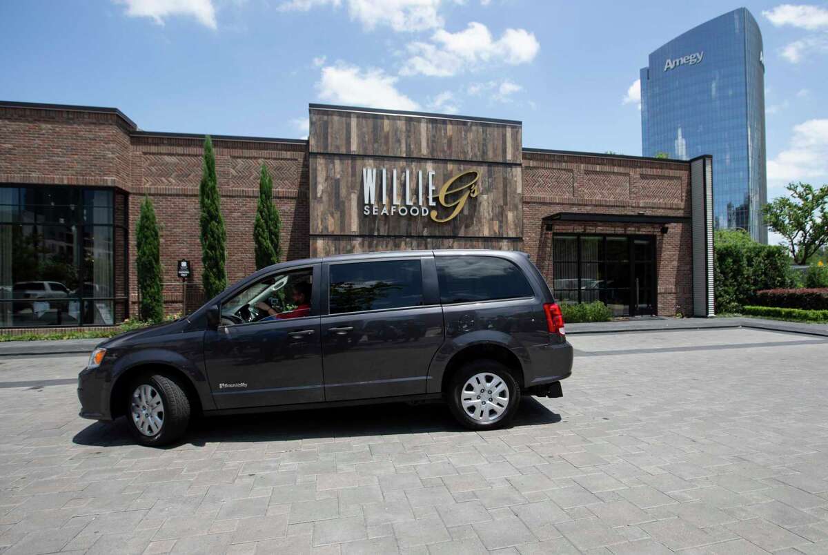 Six families receive wheelchairaccessible vans during Houston Children