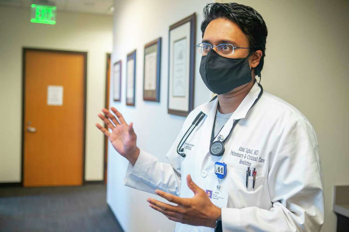 Thursday marked the third straight day Texas reported 1,000-plus cases of the novel coronavirus. Dr. Abid Iqbal, a pulmonary and critical care specialist has spent the last two months working with COVID-19 patients along with his regular patients in the Houston Methodist system, Tuesday, May 19, 2020, in Katy.