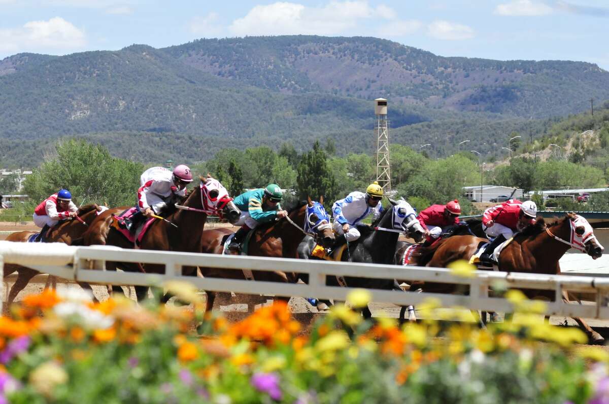 A race takes place on the Ruidoso Downs Race Track in this undated photo.