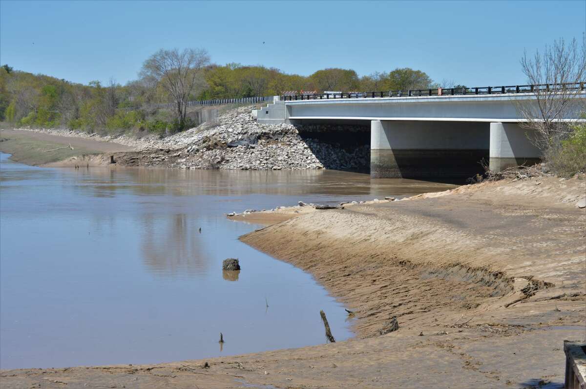 Aerial photographs show Sanford Dam Friday after flood