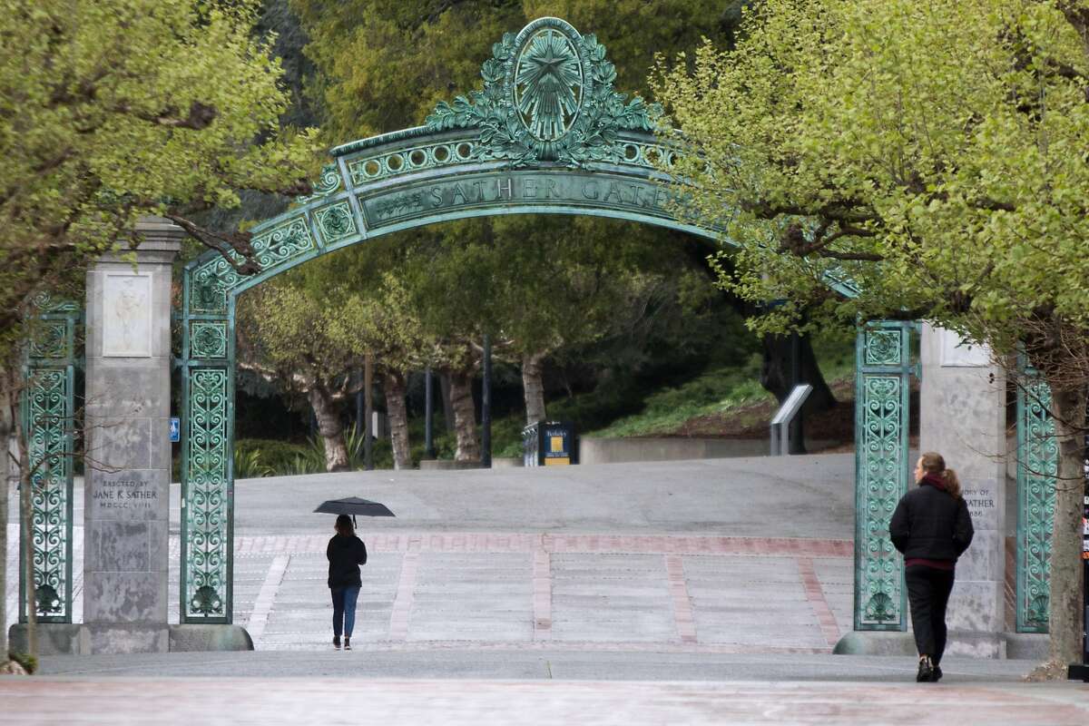 People walk on the empty UC Berkeley campus during the coronavirus shelter-in-place order in Berkeley, Calif. on March 25, 2020.