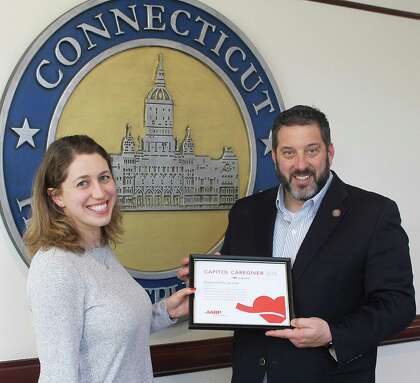 State Representative Jay Case (R-Winsted), right, with AARP’s Associate Director of Advocacy and Outreach, Anna Doroghazi.