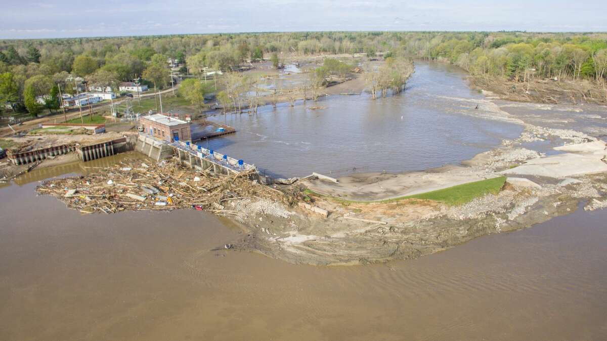 Aerial photographs show Sanford Dam Friday after flood