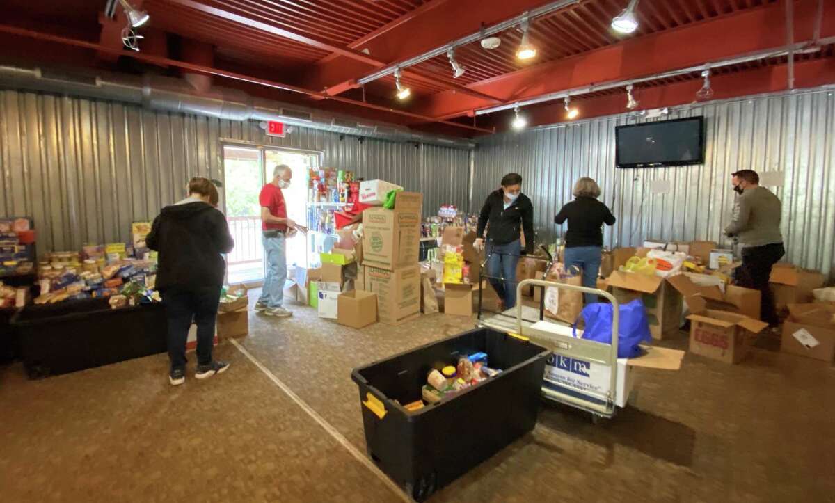 Danbury Hospital workers donate food for six pantries