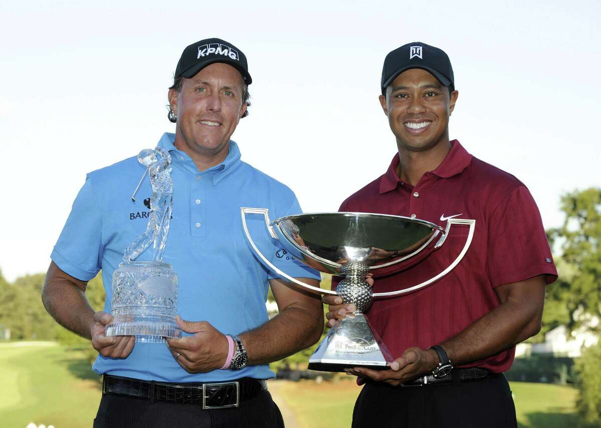 50 memorable Tiger Woods and Phil Mickelson victories Capital One’s "The Match: Champions for Charity" kicks off at 3 p.m. EST Sunday, May 24, on TNT, TBS, truTV, HLN, HLN in Canada, and CNN International. The team pro-am features duos of Tiger Woods and Peyton Manning against Phil Mickelson and Tom Brady—each mic'd up for optimal viewer access to all the chatter and trash-talk. Contested at Medalist Golf Club in Hobe Sound, Florida, the first nine holes are Four-Ball (Best Ball) format, and the back nine are Modified Alternate Shot. This rare COVID-19 sports distraction also carries the obvious intent of financial goodwill, so along the way, "there will also be a set of on-course challenges to raise additional charitable funds," per the PGA Tour. Also nicknamed Tiger vs. Phil: The Match II, this is the illustrious pair's second head-to-head match play event; though the first, which Lefty won as a slight underdog on Nov. 23, 2018, was a winner-take-all $9 million prize and was broadcast as a pay-per-view. Mickelson and Brady are +160 underdogs this time, while Woods and Mannings are the -200 favorites. To get viewers prepped for this cross-sport charity event with four undeniable legends, Stacker presents a retrospective gallery of Tiger and Phil's most memorable career victories. With 20 combined major wins (Tiger's 15, Phil's five) and an inconceivable 126 total PGA Tour titles (82 and 44 respectively), we curated this list with only 50 of the best based on prestigiousness, postseason implications, and fabled...