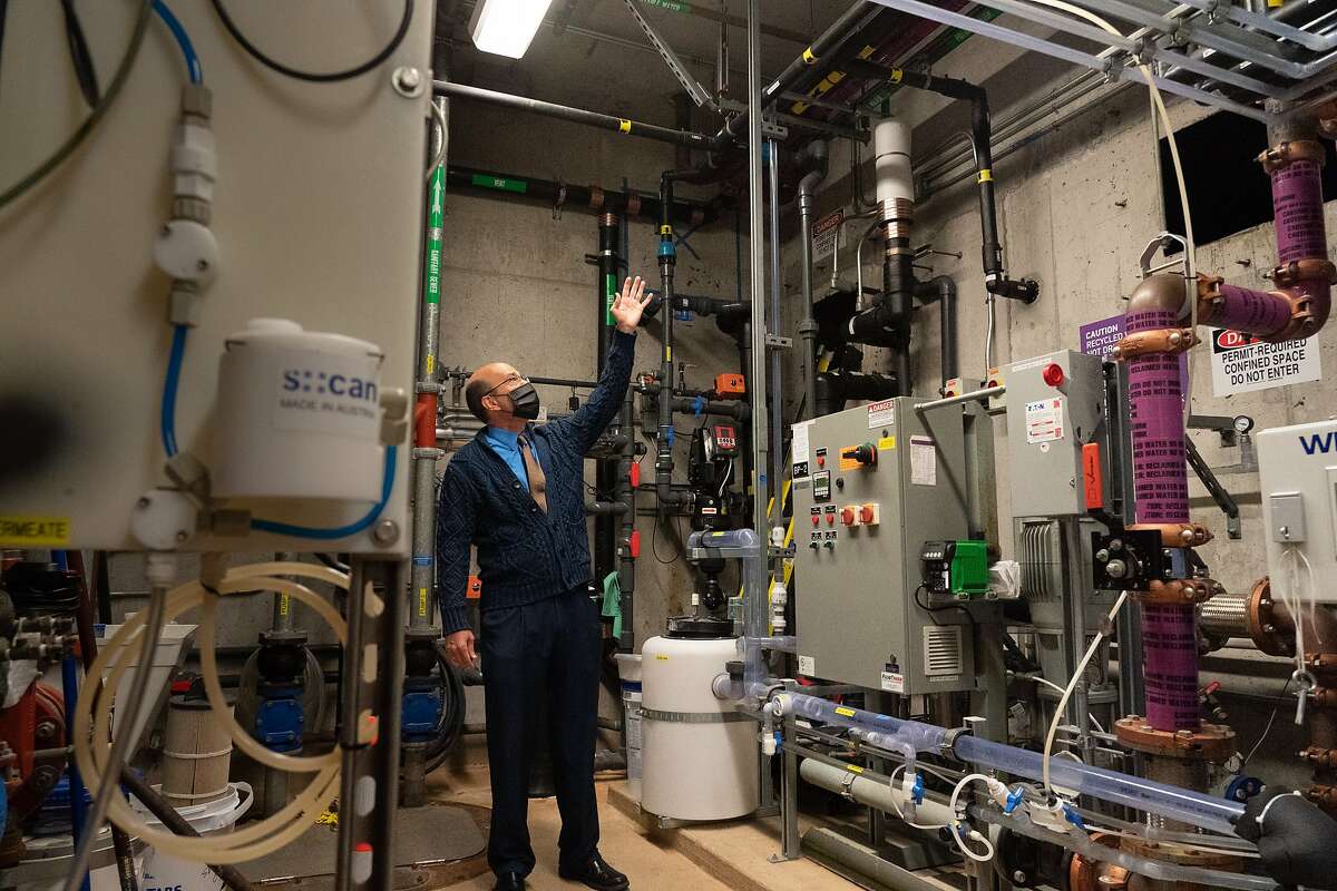 Andrew Degrassa, the general manager for water quality at the PUC, shows some of the plumbing that will be flushed out in the 13-floor SFPUC building to prevent sickness on Friday, May 22, 2020, in San Francisco, Calif. SFPUC is working with property owners to make sure that plumbing systems are opened up safely as water that sits in pipes for months can be dangerous.