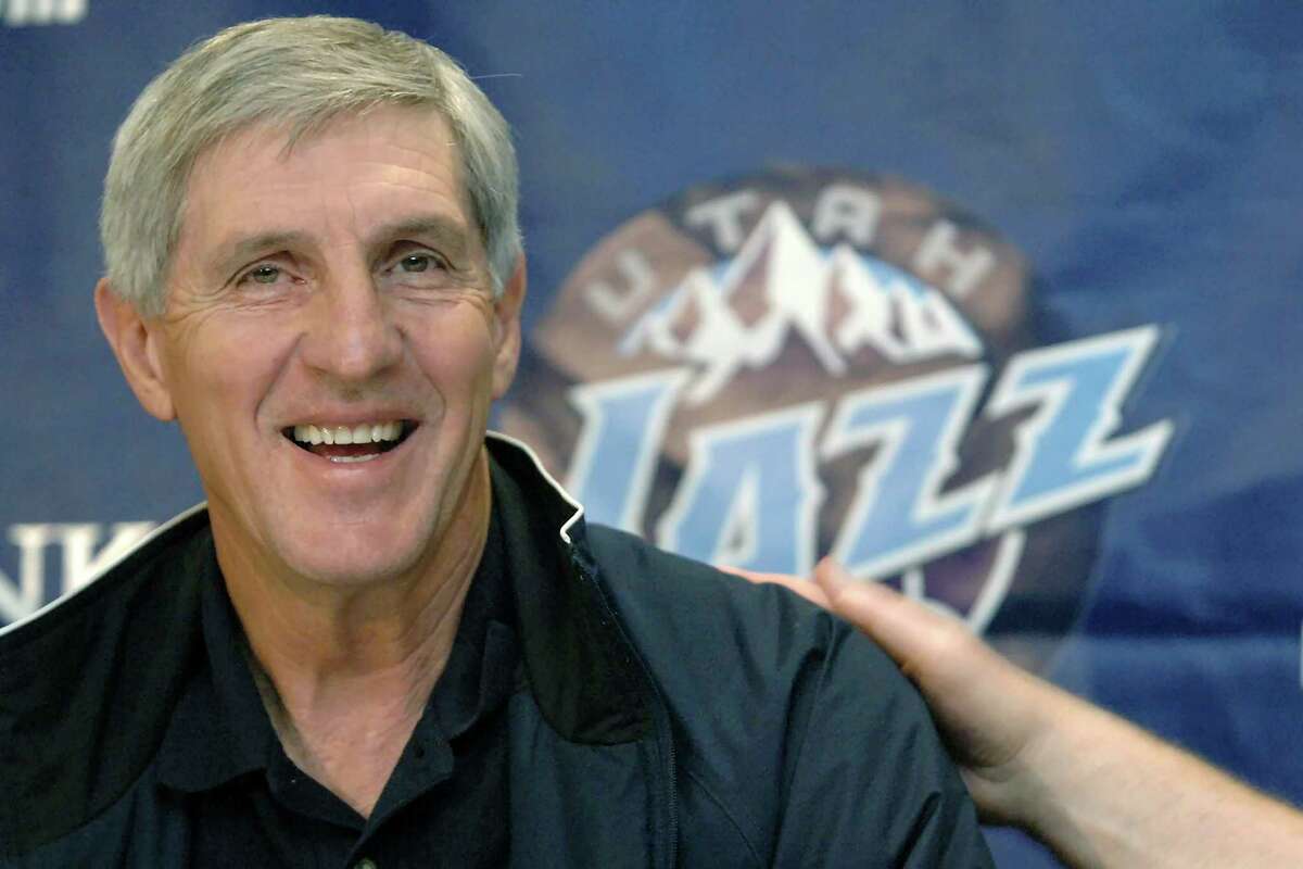 FILE - In this May 12, 2005, file photo, Utah Jazz coach Jerry Sloan smiles during a news conference in Salt Lake City. The Utah Jazz have announced that Jerry Sloan, the coach who took them to the NBA Finals in 1997 and 1998 on his way to a spot in the Basketball Hall of Fame, has died. Sloan died Friday morning, May 22, 2020, the Jazz said, from complications related to Parkinsonas disease and Lewy body dementia. He was 78. (AP Photo/Fred Hayes, File)