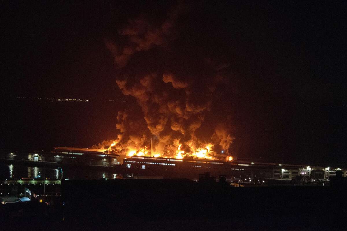A warehouse fire burns at Pier 45 in San Francisco on Saturday.