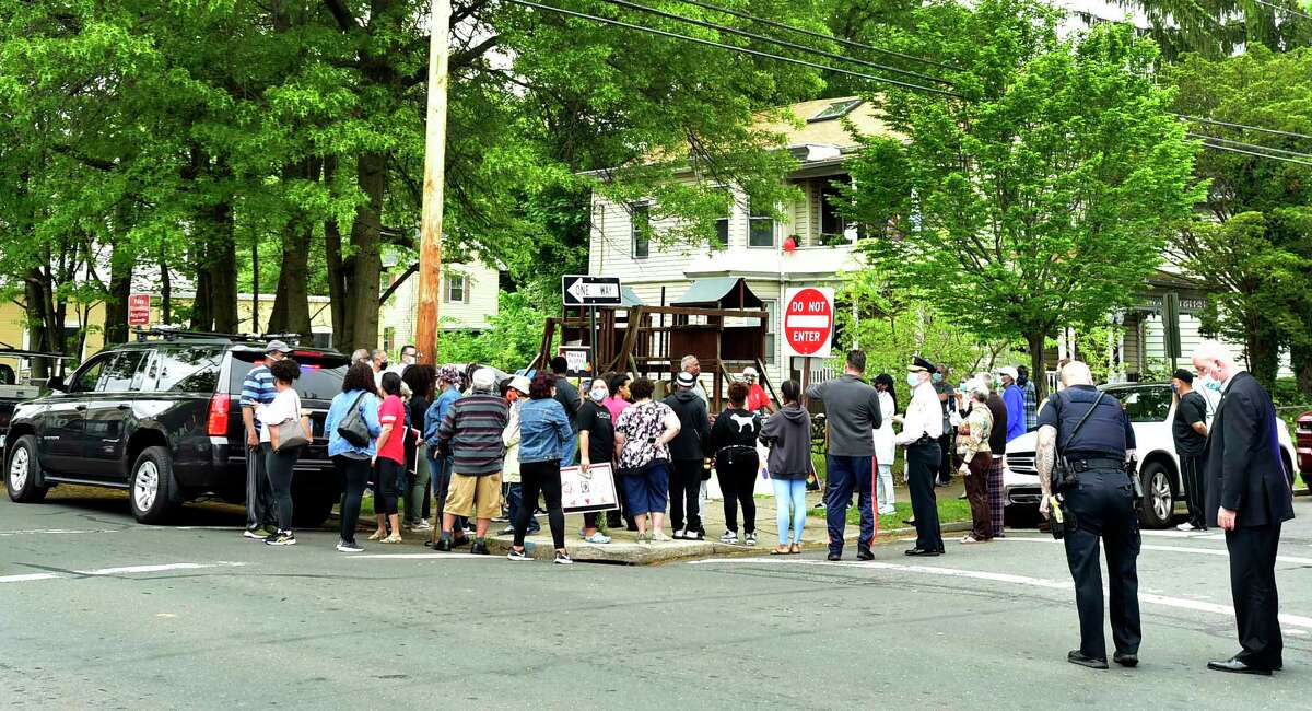 A procession of cars and well-wishers paraded through New Haven Saturday to celebrate former New Haven Alder Andrea Jackson Brooks and her service to the city. The corner of Dewitt and Spring Streets, where Jackson-Brooks lives, has been renamed in her honor.