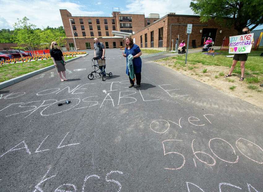 Grace Nichols, of ADAPT Capital Region, speaks during a vigil at Shaker Place Rehabilitation and Nursing in Colonie NY on Saturday, May 23, 2020 calling on New York state to support nursing home workers, transfer residents who so choose to safer settings and step up state regulations of nursing homes (Jim Franco/Special to the Times Union.)