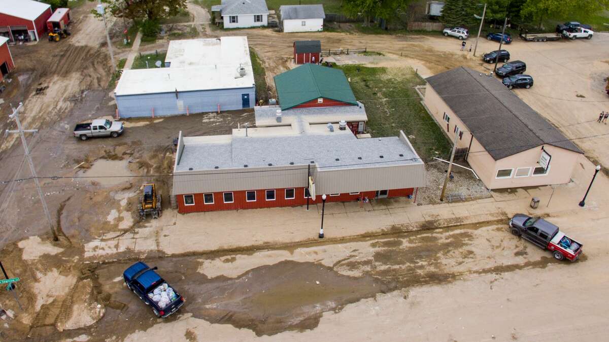 Aerial photographs show the scene in downtown Sanford Saturday, May 23, 2020 as efforts continue to clear debris and assess flood damage. (Adam Ferman/for the Daily News)