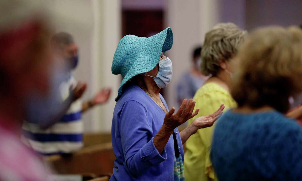 Parishioners wear face masks as they attend an in-person Mass at Christ the King Catholic Church in San Antonio on May 19. (AP Photo/Eric Gay)