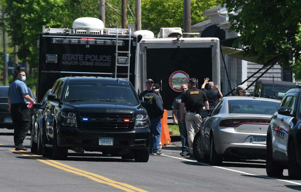 A file photo of local and state police investigating one of the crimes allegedly committed by Peter Manfredonia in Connecticut in late May 2020.