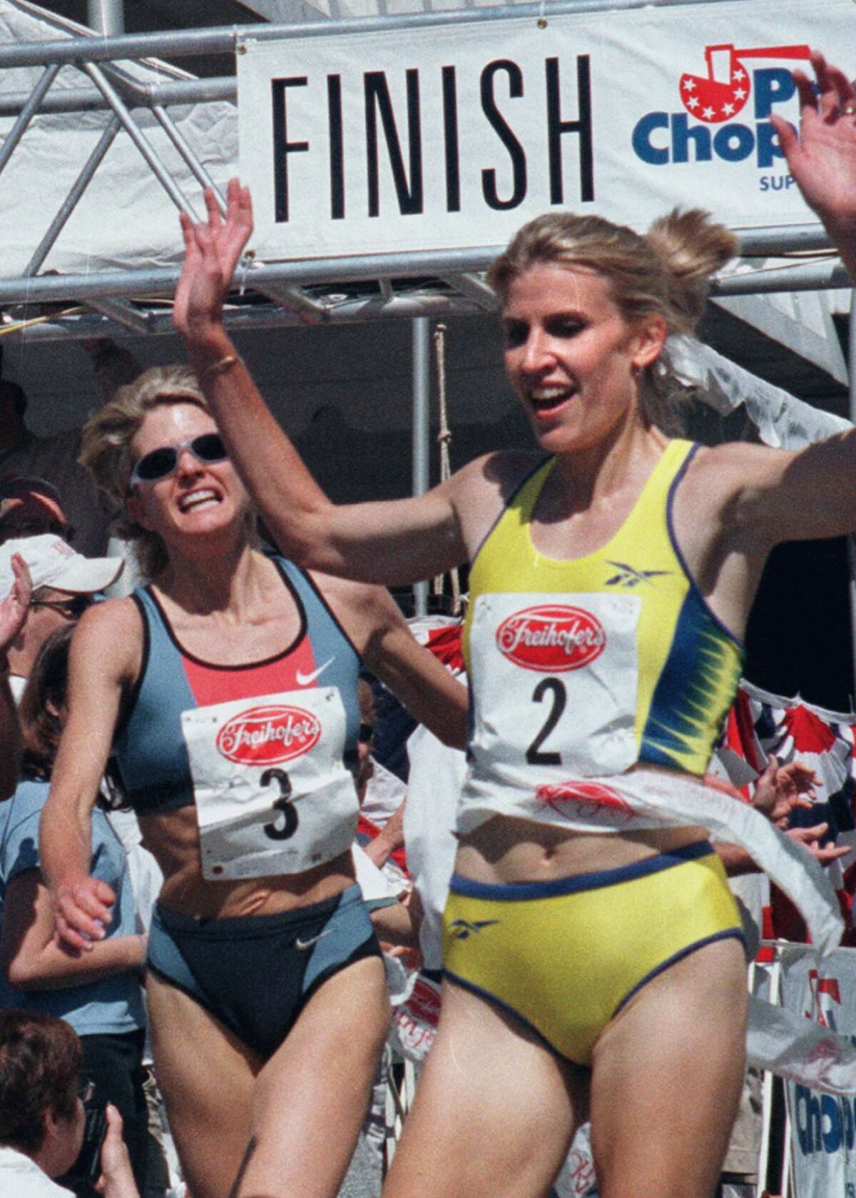 Times Union Staff Photo by STEVE JACOBS , 6/5/99, Albany,NY-- TO THE FINISH -- Friehofer womens race first place finisher, Cheri Goddard-Kenah,right, crosses the tape as second place finisher, Libbie Hickman closely follows for a second place finish, Saturday ( for sports)