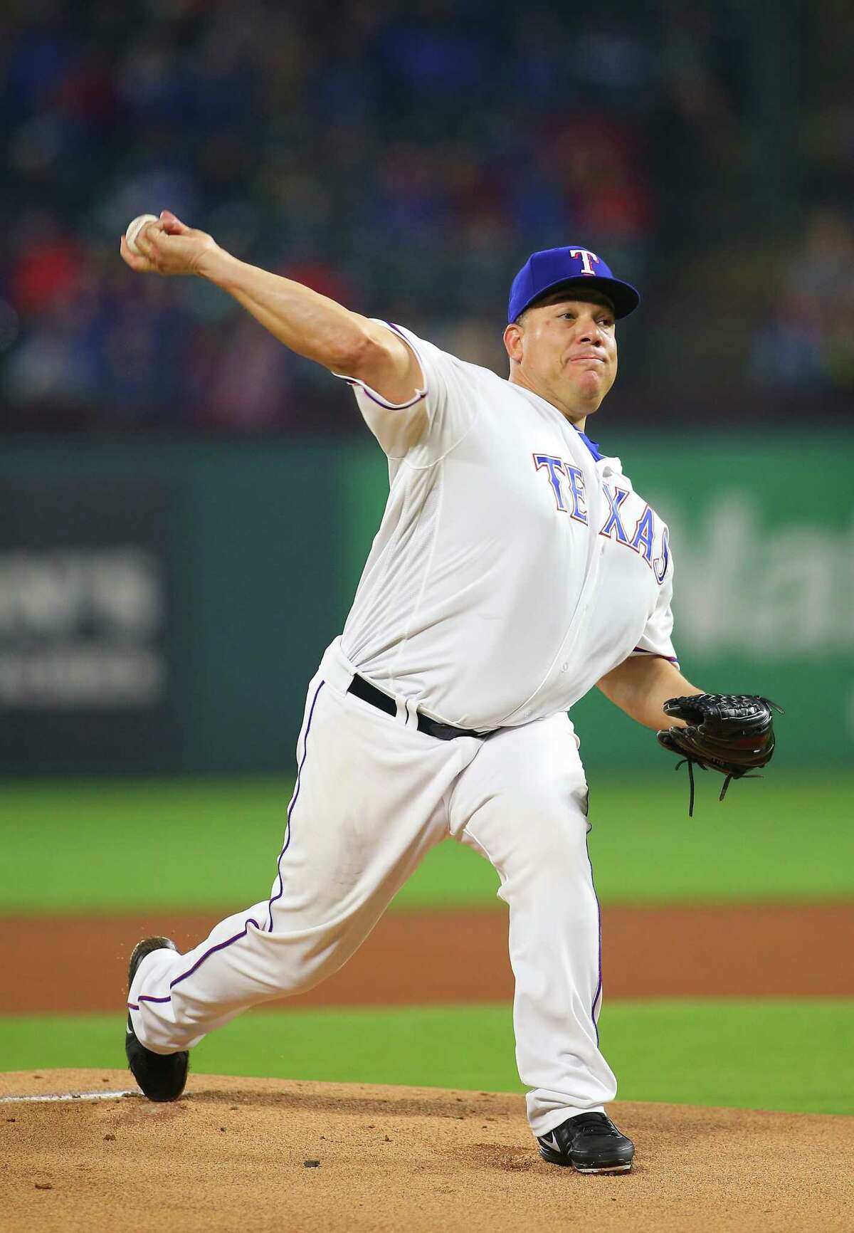 ARLINGTON, TX - APRIL 21: Bartolo Colon #40 of the Texas Rangers throws in the first inning against the Seattle Mariners at Globe Life Park in Arlington on April 21, 2018 in Arlington, Texas. (Photo by Rick Yeatts/Getty Images)
