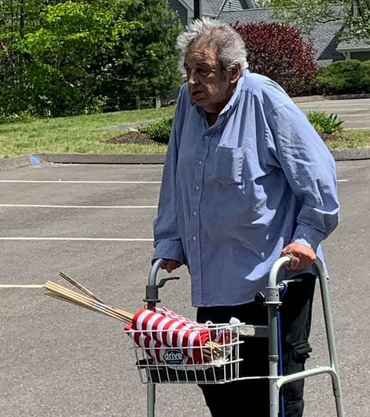 Joseph Bennetta spent the days prior to Memorial Day walking around the Meadow Lake Condominium complex in which he lives, placing American flags at each home.