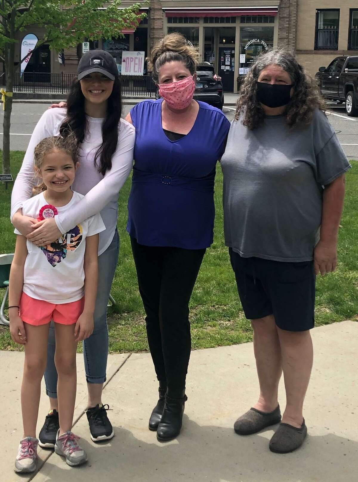 Celebrating a birthday isn't what it used to be these days. Living during a pandemic, when restrictions are in place regarding the amount of people permitted at a gathering and social distancing measures in place, makes it difficult to celebrate a special occasion like a birthday difficult. Lyliana Martinez of New Milford wanted to do something special for her 10th birthday, so she asked family and friends to stop by the Village Green May 17 to say hello and invited people to make a donation to benefit first responders. Her family surprised her with a parade of fire trucks, town trucks and family and friends. Lyliana collected $510 to donate. Above, Lyliana is shown with, from left to right, her mother, Ashley McKenney, grandmother, Darlene Bishop, and great-grandmother, Carol Delancy. May 17, 2020