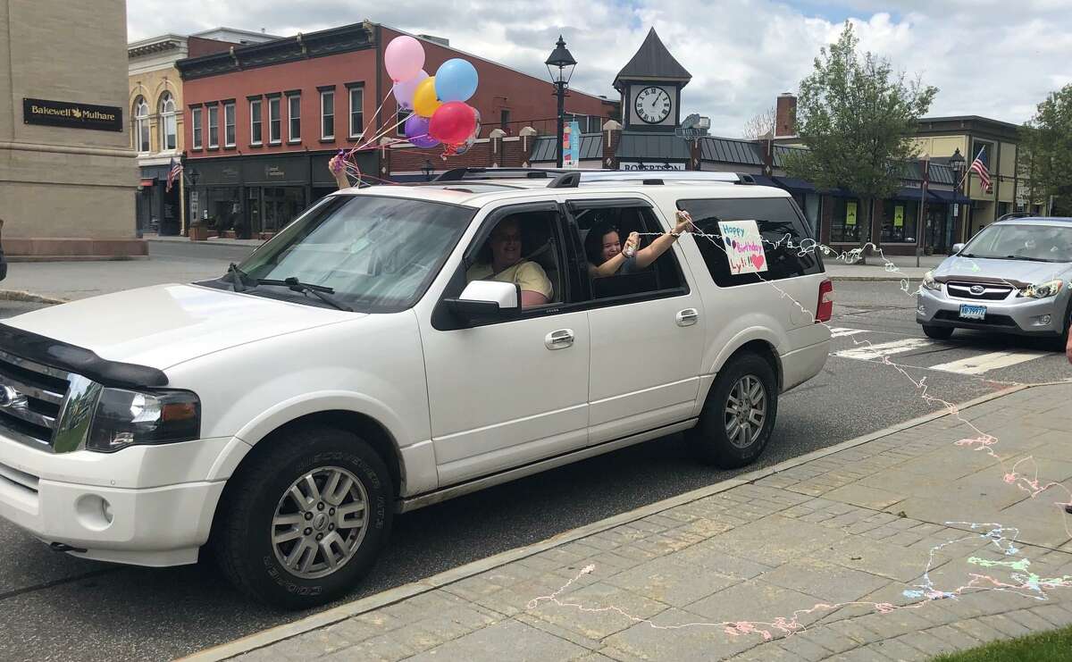 Family and friends share their excitement for Lyliana Martinez's birthday as they make their way along the Green.