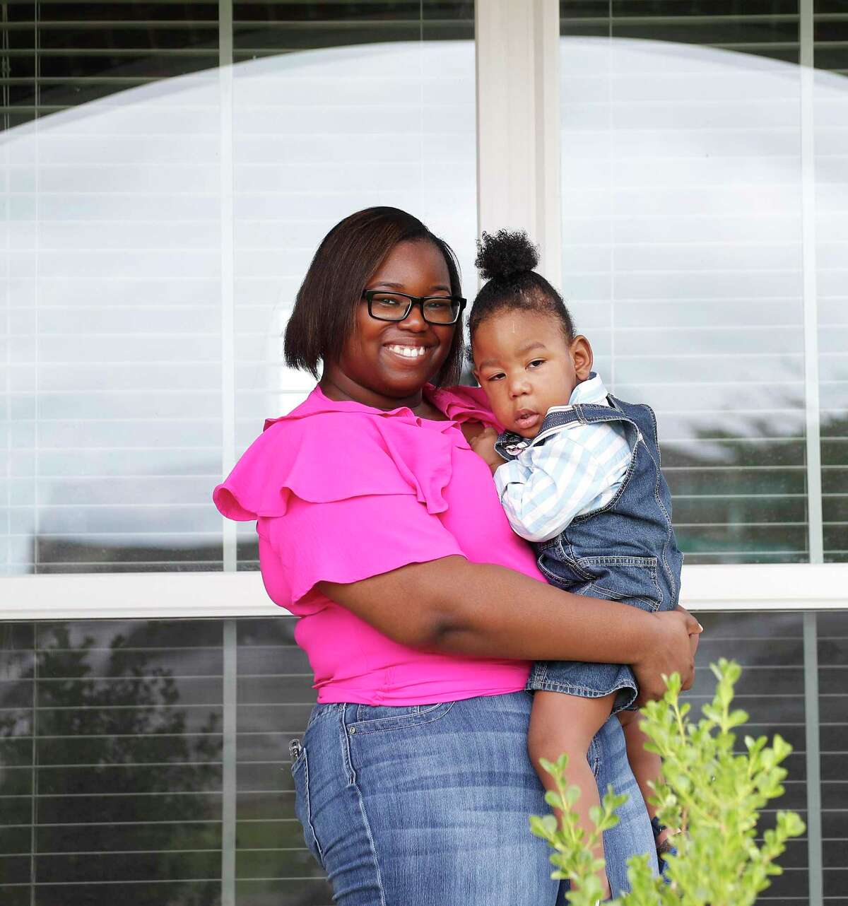 Aisha Atkinson with her two-year-old son, Aries, at home, in Rosenberg, Saturday, May 16, 2020. Aries was born at 23 weeks gestation. He had two massive brain bleeds and spent 150 days in the NICU. He will have chronic hydrocephalus and cerebral palsy his entire life, doctors estimate. Aries is one out of four babies to use a new device called CTOT, which is a wearable imaging device for awake infants with brain disorders. It was made using night-vision goggle technology, near-infrared light and high-resolution detectors. The device (which is a cap with wires) is used so babies don't have to be put under anesthesia which is super risky for them.