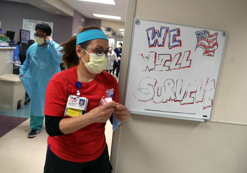 Nurses rush to meet with a patient that his being admitted to the emergency room at Regional Medical Center on May 21, 2020 in San Jose, California. Frontline workers are continuing to care for coronavirus COVID-19 patients throughout the San Francisco Bay Area. Santa Clara county, where this hospital is located, has had the most deaths of any Northern California county, and the earliest known COVID-19 related deaths in the United States.