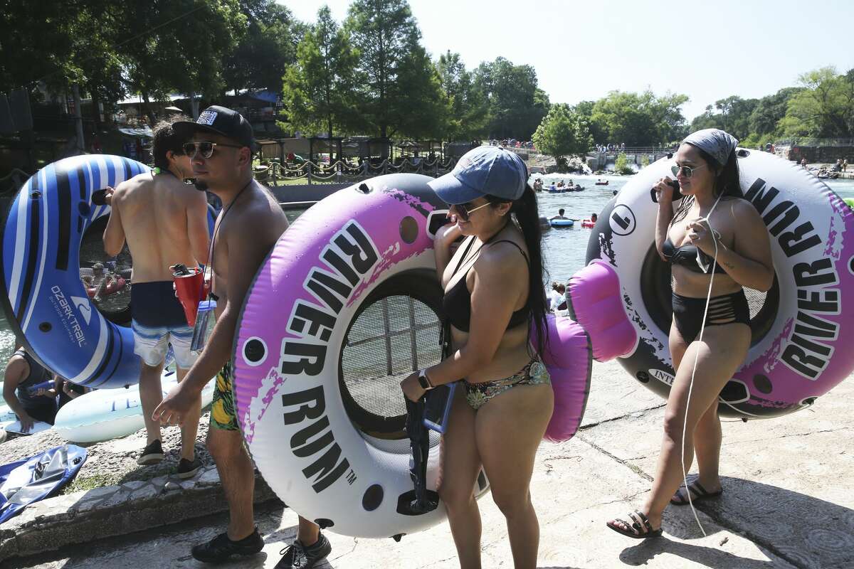 Tubers take to the Comal River at HInman Island Park in New Braunfels on May 20, 2020.