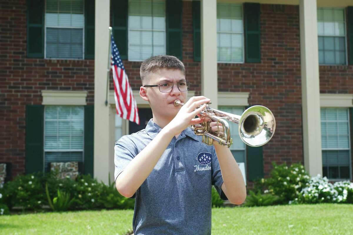 Victory Lakes Intermediate School student Marshall Calderon participates in the “Taps Across America” program on Monday by playing “Taps” at 3 p.m. in honor of fallen heroes during Memorial Day.