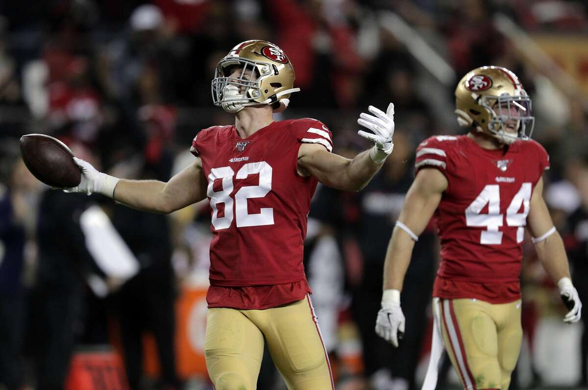 Ross Dwelley (82) gestures after catching a 25-yard pass from Jimmy Garoppolo (10) that set up a 49ers touchdown in the fourth quarter as the San Francisco 49ers played the Los Angeles Rams at Levi’s Stadium in Santa Clara, Calif., on Saturday, December 21, 2019.