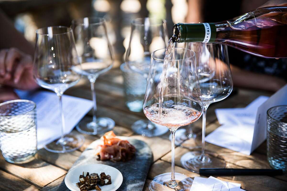 Wine is poured during a tasting at Reeve Winery in Healdsburg, California on June 29, 2017.