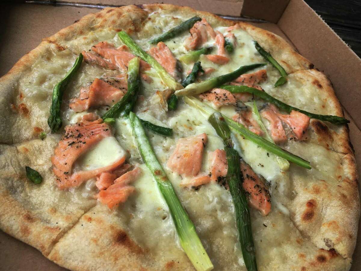 The Pizza Salmon at Braza Brava Pizza Napoletana comes with fresh mozzarella, olive oil, asparagus and salmon.