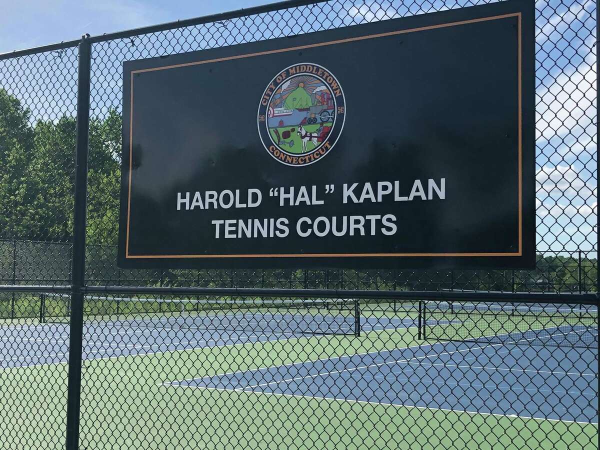 A sign on the fence at the Harold ‘Hal’ Kaplan tennis courts Wednesday in Middletown.