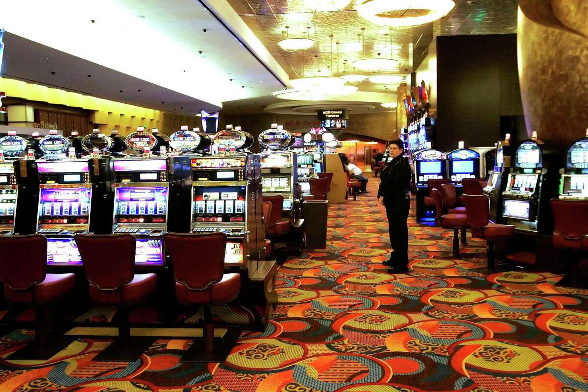 In this May 13, 2008, file photo, one of the slot machine rooms at the new MGM Grand Hotel stands ready for the start of business in Mashantucket at the Foxwoods Resort Casino.