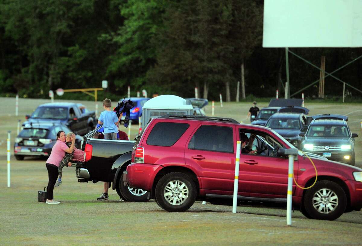 Patrons enjoy movies offered on three screens at Mansfield Drive-In Movie Theater in Mansfield, Conn., on Tuesday May 26, 2020.