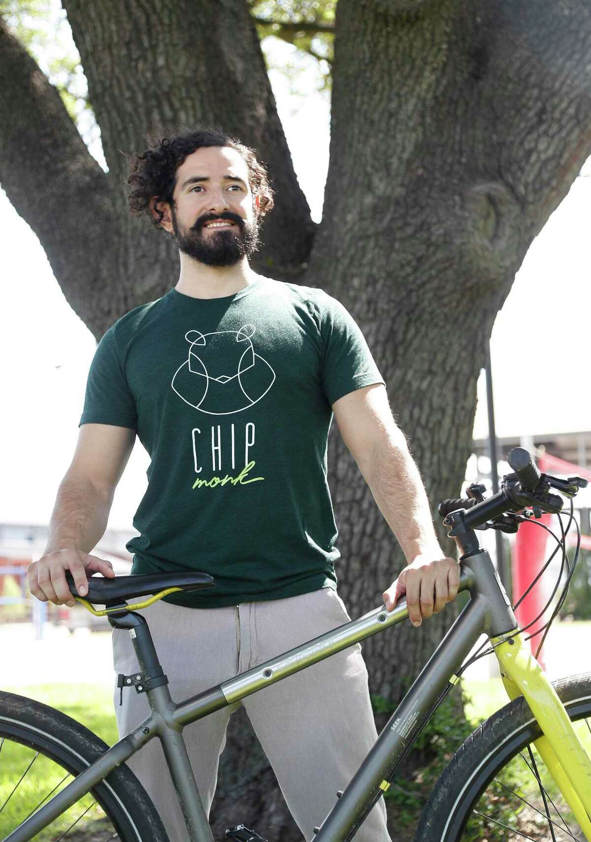 Jose Hernandez poses with his bike in Houston, Thursday, May 7, 2020. Hernandez is a transformation story, he always had a sweet tooth but never worried about it. He was fit and lean, when his energy and moods started changing. At one point, he went to the doctor to try to figure out what was going on and discovered that he had type 2 diabetes. Instead of taking medication, he completely changed his diet and started intermittent fasting. Now his blood sugar is totally normal. Because he missed sweets, he started a baking company for people like him -- with no sugar and no gluten, to stay low carb called who started ChipMonk baking. He started the business by sampling cookies at the Cannon office and now has gone into baking full time
