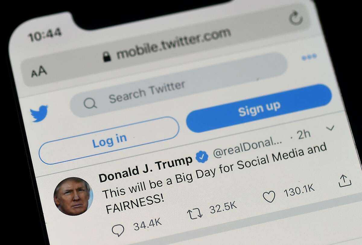 The twitter page of US President Donald Trump's is displayed on a mobile phone on May 28, 2020, in Arlington, Virginia. - Trump is expected to sign an executive order on May 28, 2020, after threatening to shutter social media platforms following Twitter's move to label two of his tweets misleading. (Photo by Olivier DOULIERY / AFP) (Photo by OLIVIER DOULIERY/AFP via Getty Images)