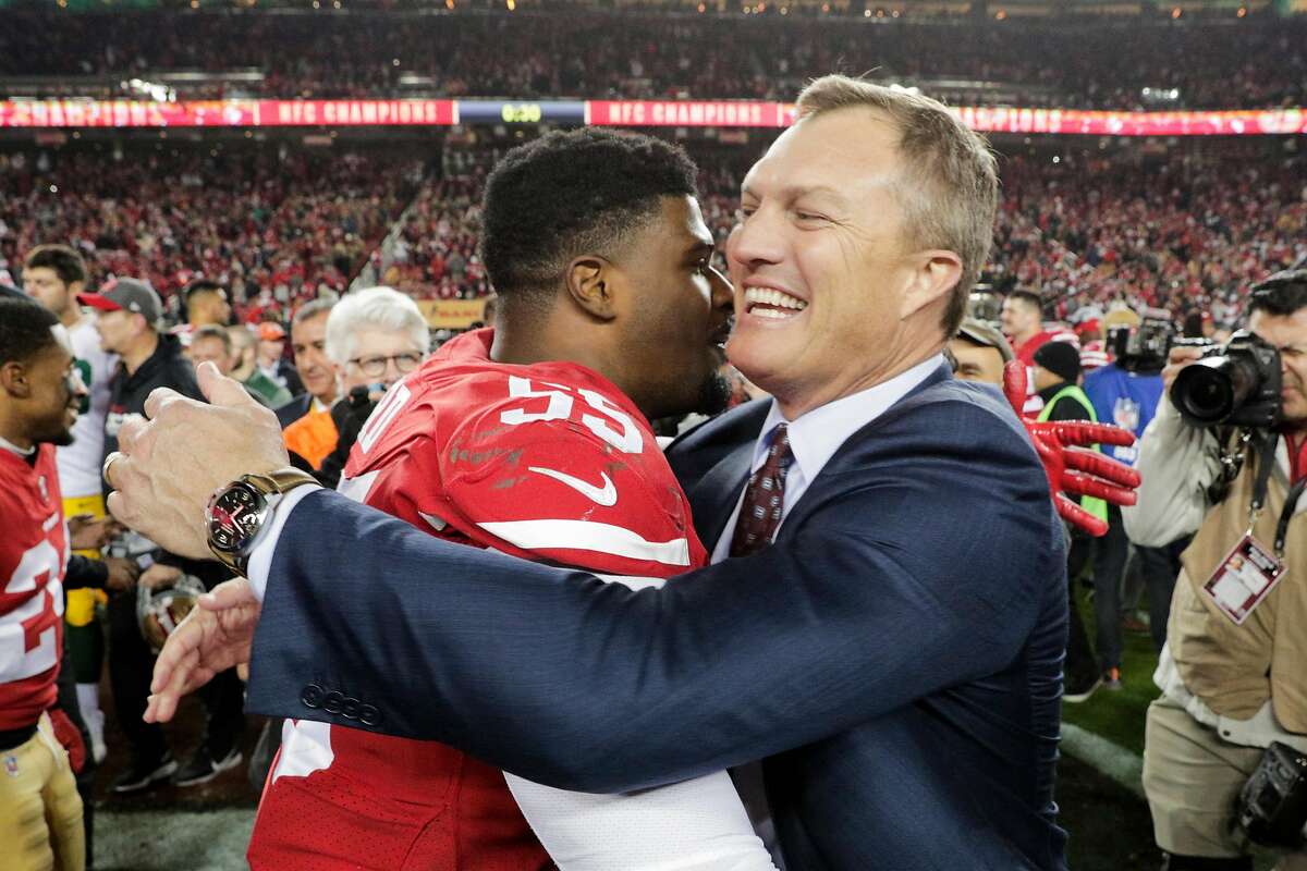 San Francisco 49ers’ Dee Ford and general manager John Lynch celebrate the team’s 37 to 20 win in the NFC Championship game between the San Francisco 49ers and the Green Bay Packers at Levi’s Stadium on Sunday, Jan. 19, 2020 in Santa Clara, Calif.