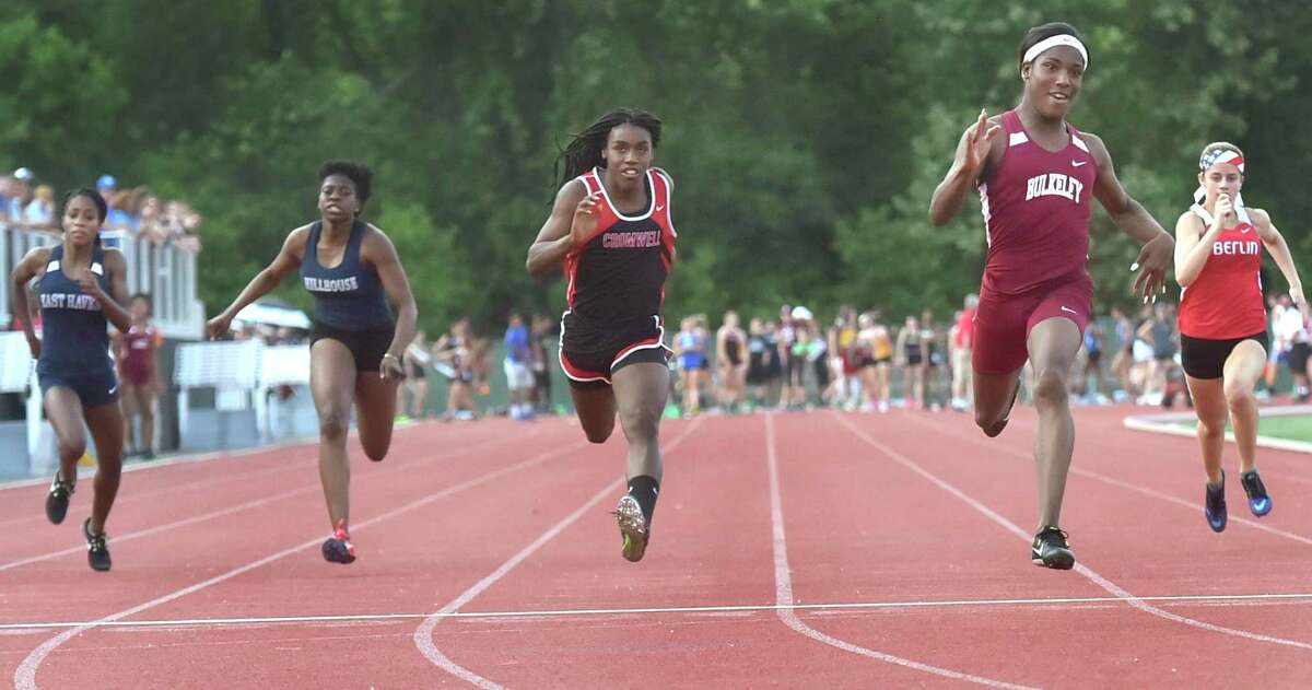 Terry Miller of Bulkeley High School, fourth from left, wins the girls 100-meter dash finals at the CIAC Class M outdoor championships in May 2018. Cromwell’s Andraya Yearwood, third from left, placed second.