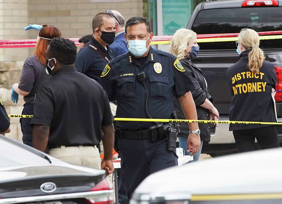 Houston Police Chief Art Acevedo walks through the scene as investigators work an officer-involved shooting in front of the Walgreens on South Braeswood in Houston on Saturday, May 16, 2020. Starting April 21, there have been six fatal shootings by HPD officers.