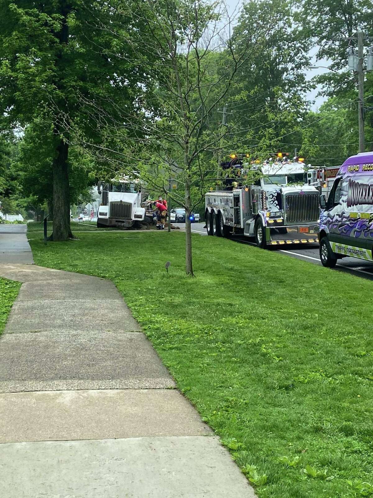 Main Street is closed from Branchville Road to Market Street following a Friday morning accident involving a septic system truck near King Lane.