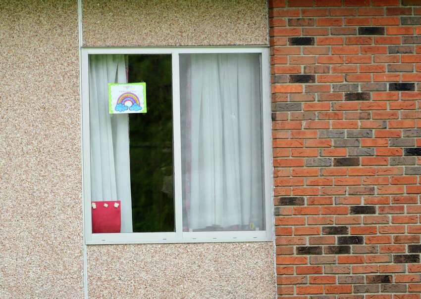 A 518 Rainbow Hunt sign is seen in a resident's window at The Grand Rehabilitation and Nursing at Guilderland on Wednesday, May 6, 2020 in Guilderland, N.Y. (Lori Van Buren/Times Union)