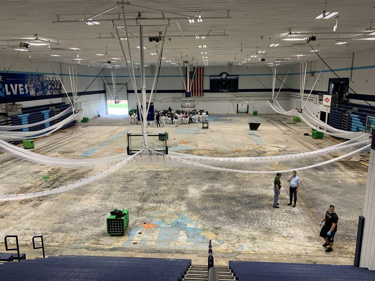 Riepma Arena's torn-up gym floor is seen inside Northwood's Bennett Center on Friday, May 29.